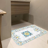 Mediterranean doormat with colorful floral design in a bathroom setting. Decorative and functional, suitable for indoor use.