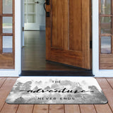 Forest entrance doormat with "The Adventure Never Ends" quote, indoor/outdoor rubber floor mat for home decor
