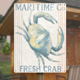 Nautical metal sign with a watercolor crab, 'Maritime Co. Fresh Crab' text, kitchen decor.
