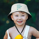 Custom baby sunhat with 'YOUR DESIGN HERE' on a smiling boy. Breathable polyester twill fabric, shop at MyArtsyGift
