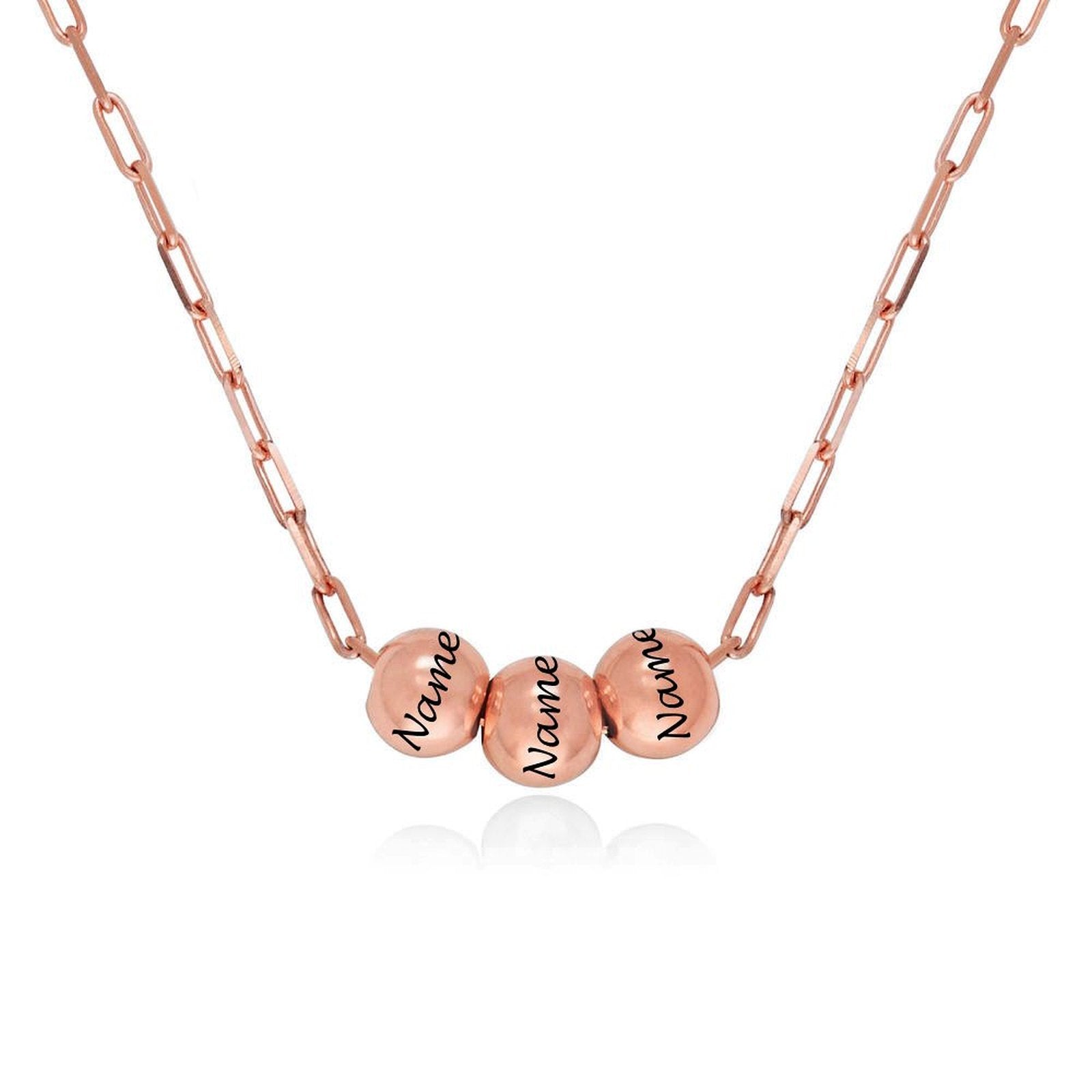 Rose gold custom name necklace with engraved beads. Personalized jewelry gift.