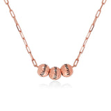 Rose gold custom name necklace with engraved beads. Personalized jewelry gift.
