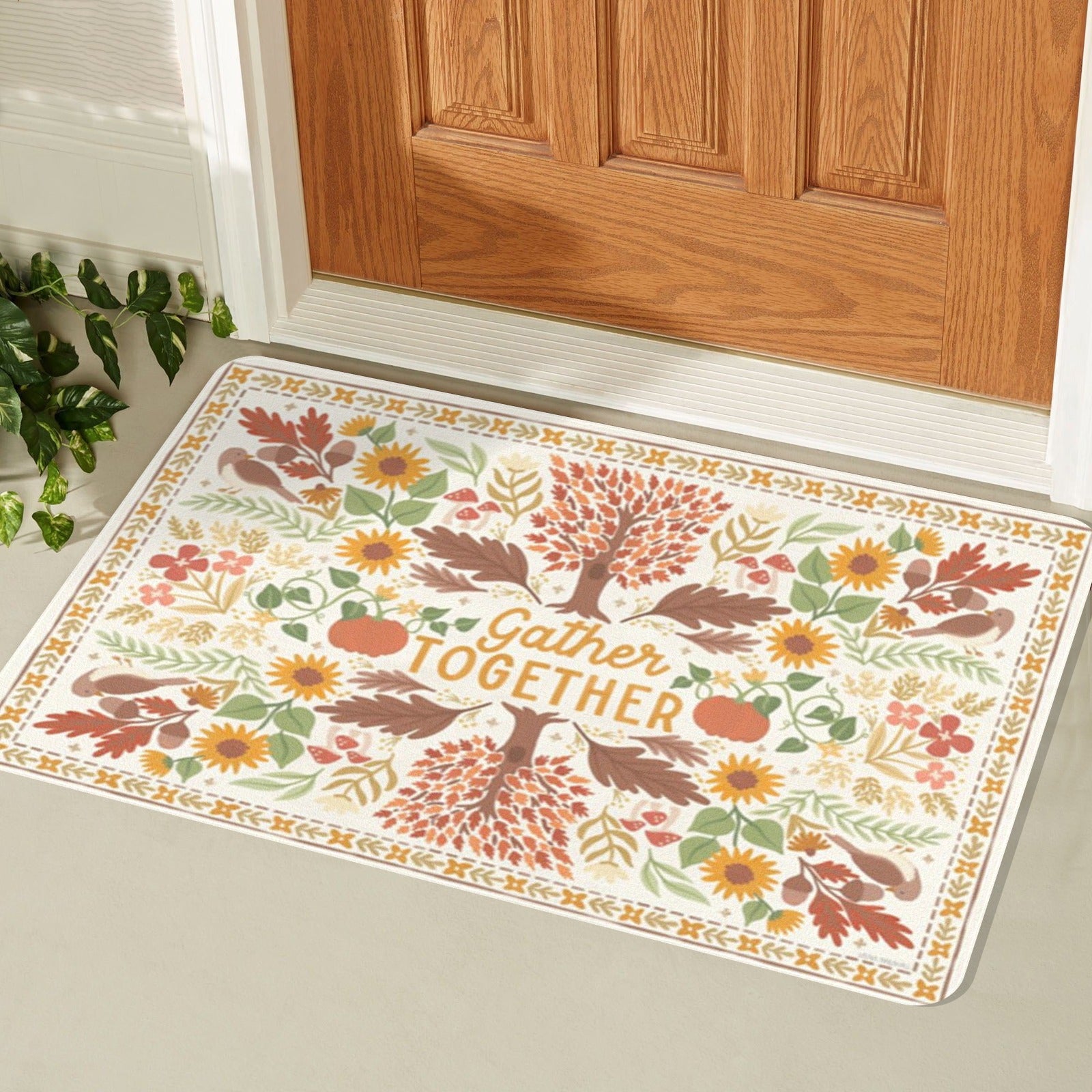 Autumn entrance doormat with 'Gather Together' text, fall leaves and floral design.