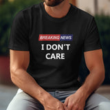 Black Gildan Unisex T-shirt with "Breaking News I Don't Care" print, comfortable cotton tee