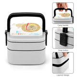 Kids' double-layer bento lunch box with lion design and 'BE CURIOUS' text, ideal for school or travel.