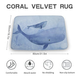 Coral velvet bathroom rug with whale design, non-slip, absorbent and comfortable.