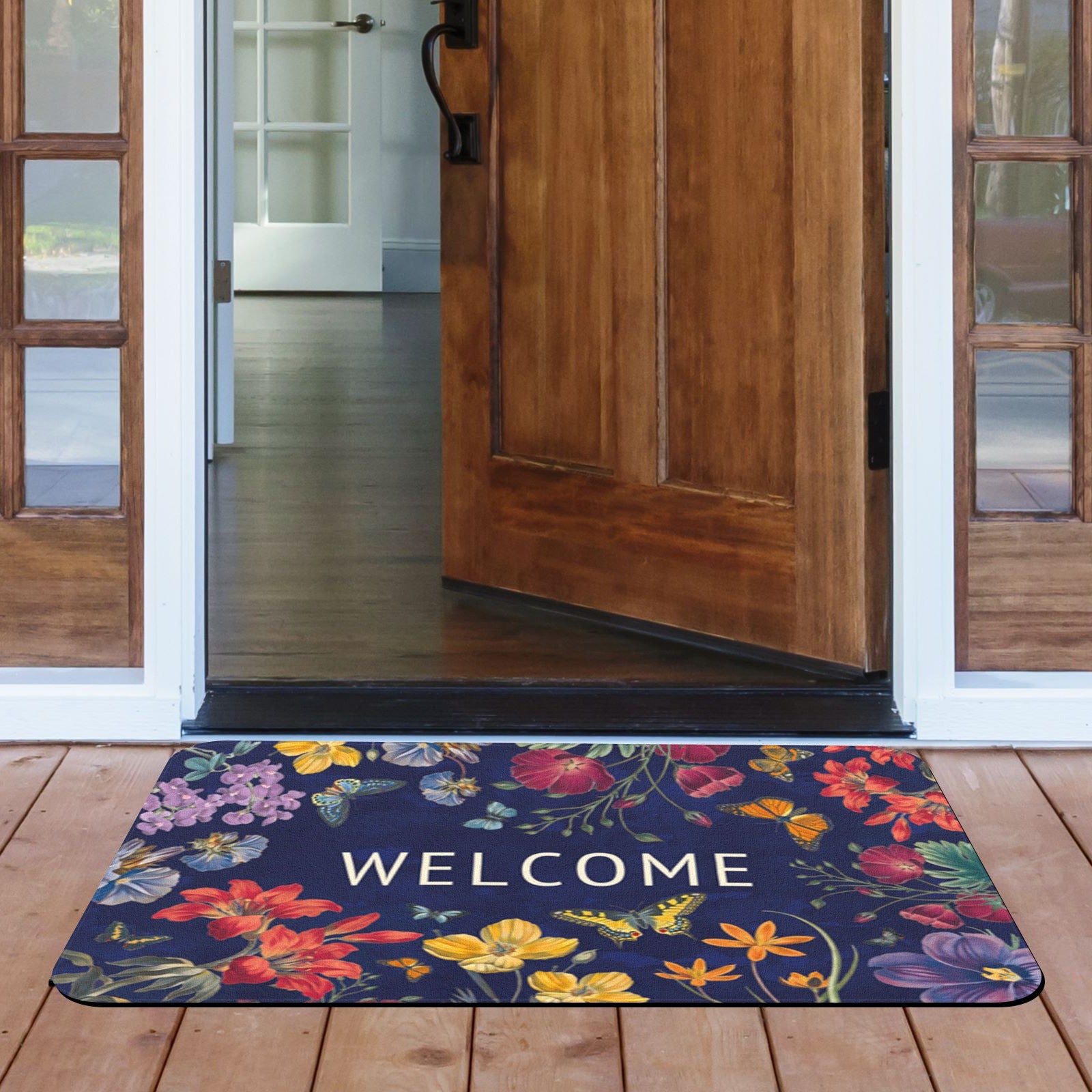 Butterfly and floral welcome doormat with dark blue background, for indoor or outdoor use.