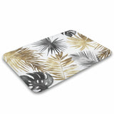 Coral velvet bath rug with gold, grey, and black watercolor palm leaves, non-slip bathroom floor carpet