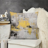 Abstract art plush pillow cover in yellow, gray, and black for sofa. Soft and fluffy decorative cushion for living room.