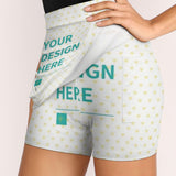 Women's customizable tennis golf skort. White fabric with heart print, and 'YOUR DESIGN HERE' text.