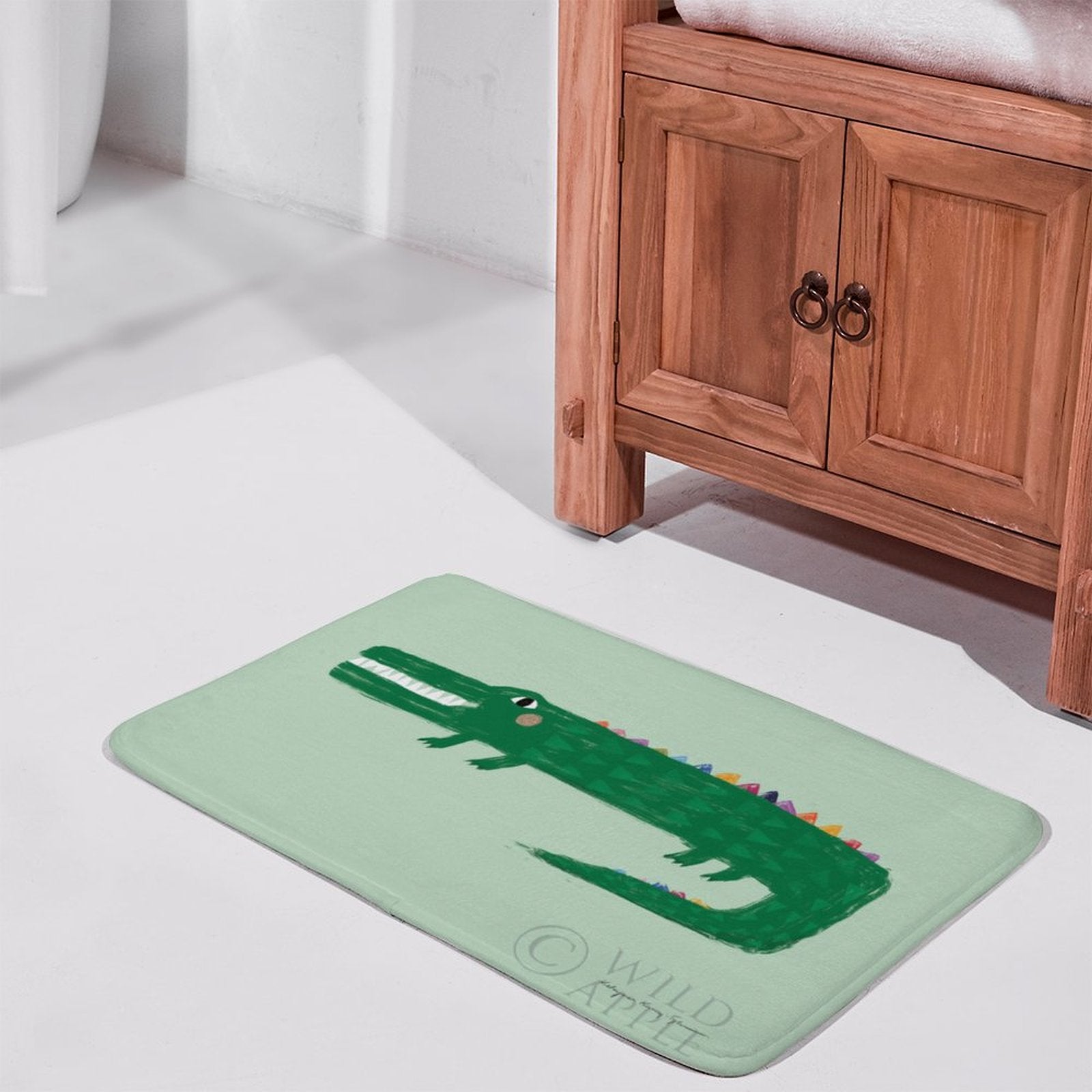 Green alligator bath rug by Wild Apple for bathroom. Non-slip, absorbent coral velvet bath mat.