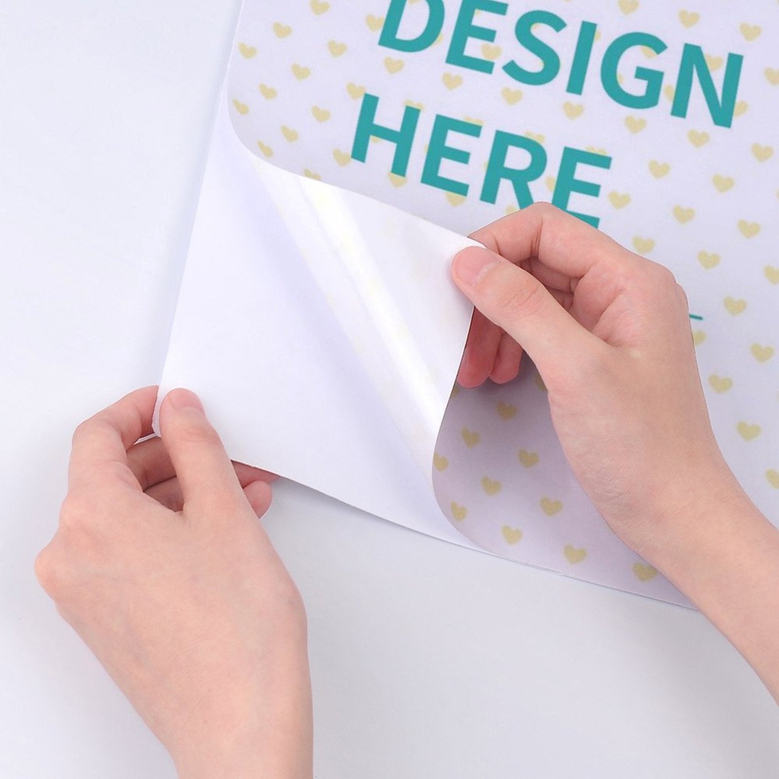 Peeling custom sticker, revealing adhesive. Design your personalized stickers for gifts and more!