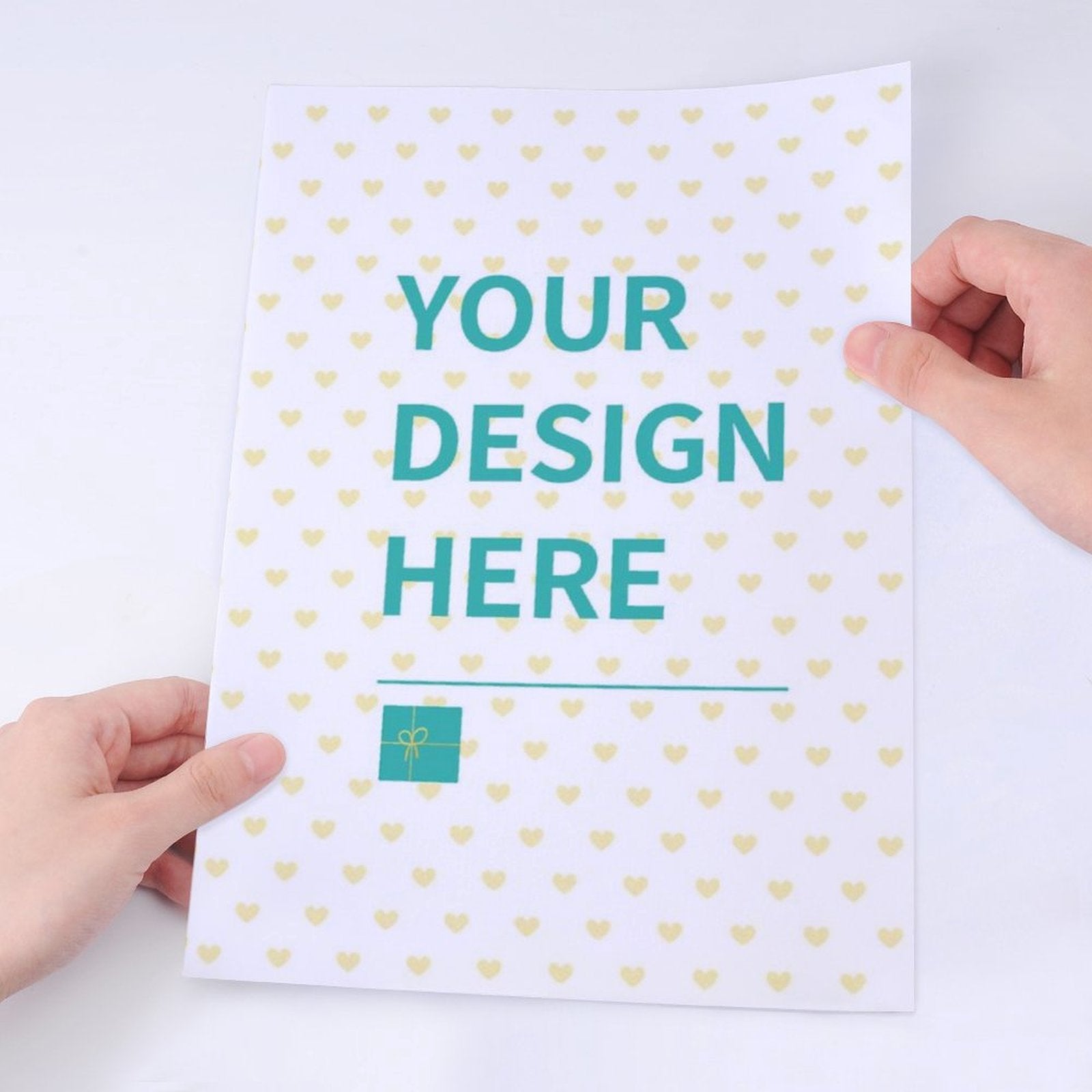 Customizable sticker sheet with 'YOUR DESIGN HERE' text and heart pattern, perfect for gifts and personalized labels.