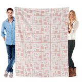 Blush-full Flannel Blanket with White Geometric Pattern, held by people, soft, cozy, and stylish
