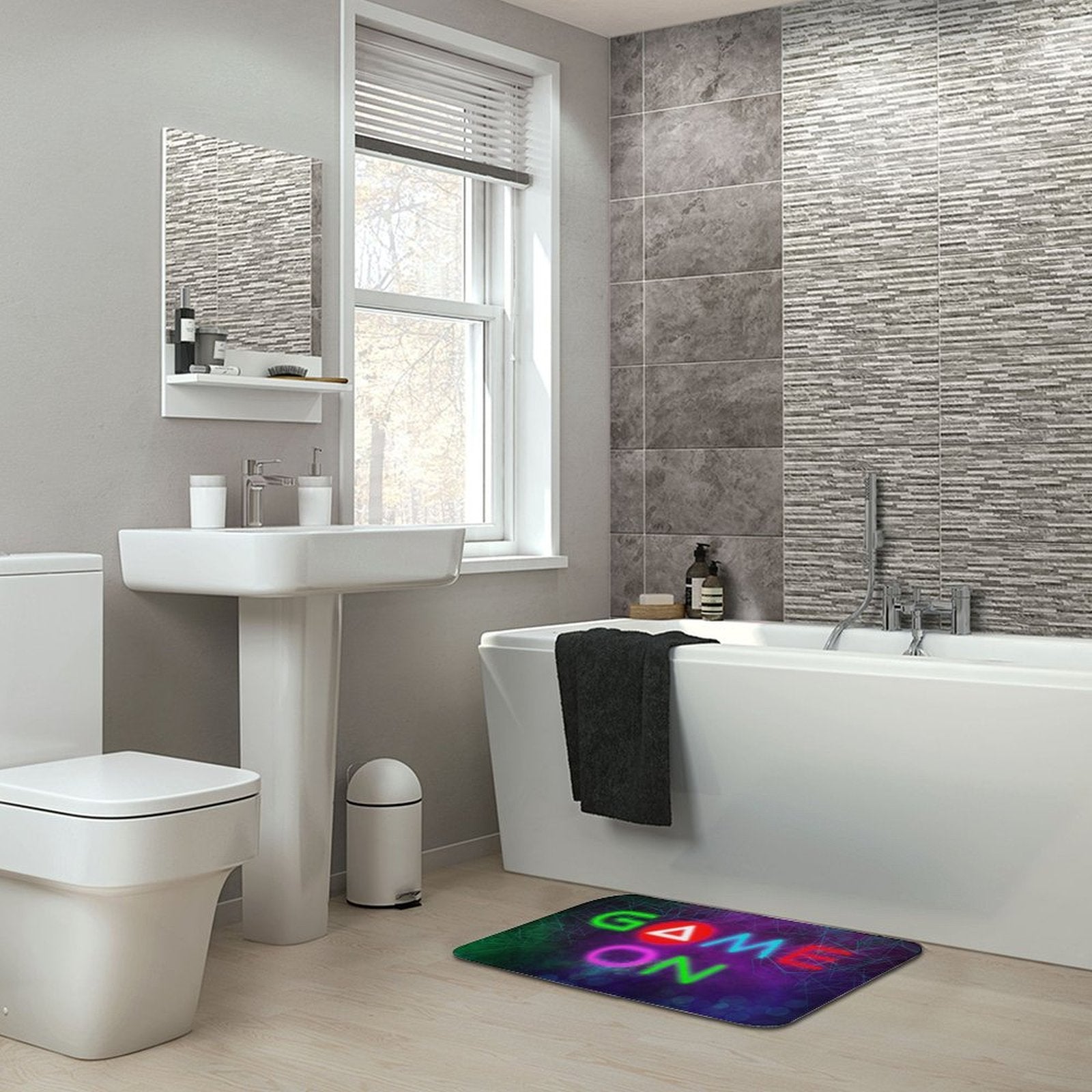 Coral velvet bath rug with neon 'GAME ON' design in a modern bathroom setting, non-slip floor carpet