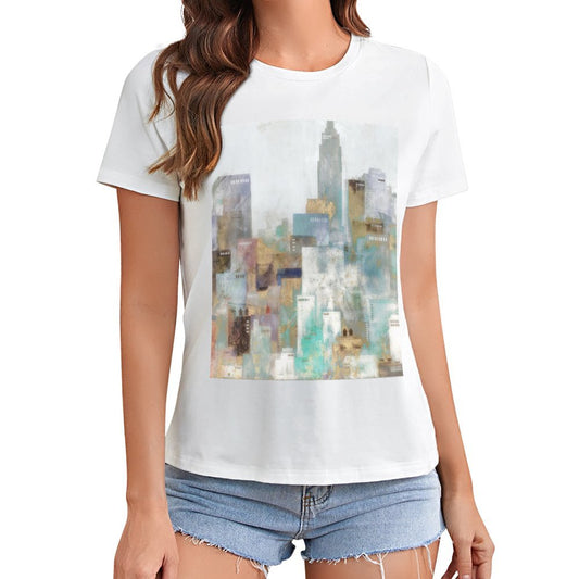 Women's white short sleeve crewneck t-shirt with colorful abstract cityscape graphic.