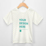 Customizable kids' t-shirt with heart pattern and 'YOUR DESIGN HERE' text, made of mesh fabric.