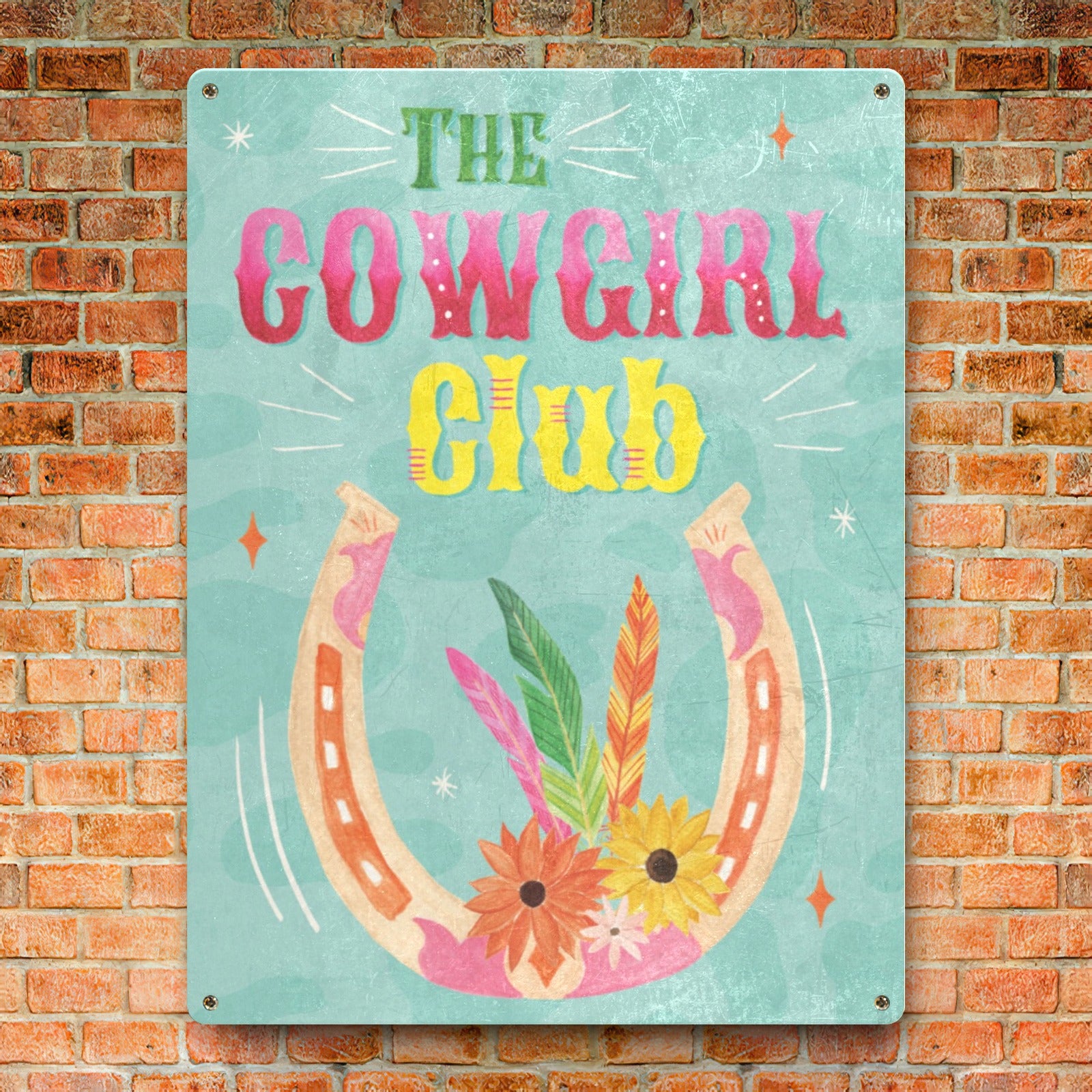 Cowgirl Club tin sign with horseshoe, feathers, and floral design, home decor. Made in USA.