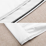 Close-up of white tube top with black stitching. Soft, comfortable seamless bralette for women. Ideal for summer.