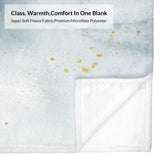 Blue abstract flow blanket with gold accents, soft fleece material.