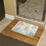 Floral bath rug on wooden floor with bathroom shower, non-slip design, perfect for bathroom or kitchen
