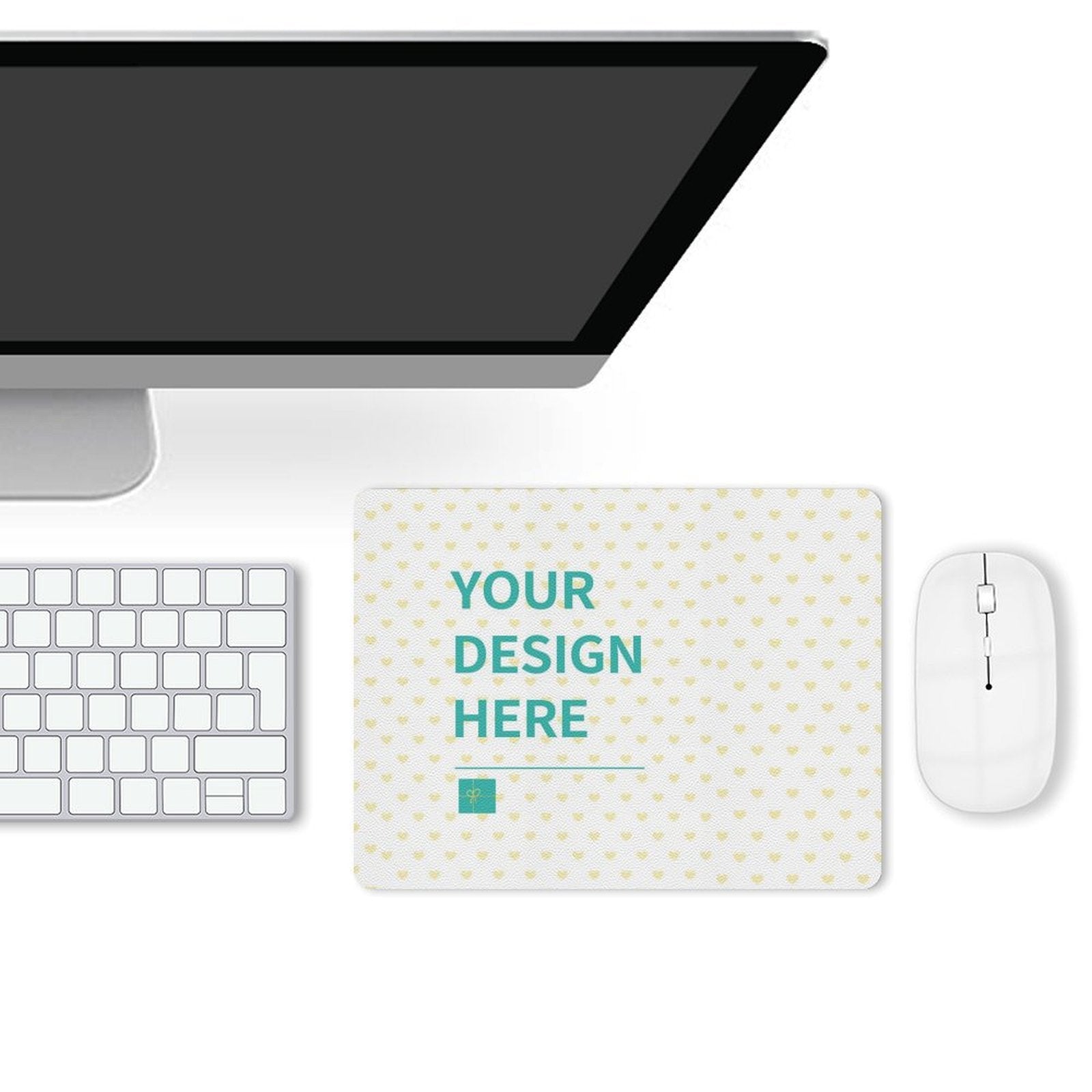 Customizable desk mat with "YOUR DESIGN HERE" text, white mouse, keyboard, and monitor setup for office or home.