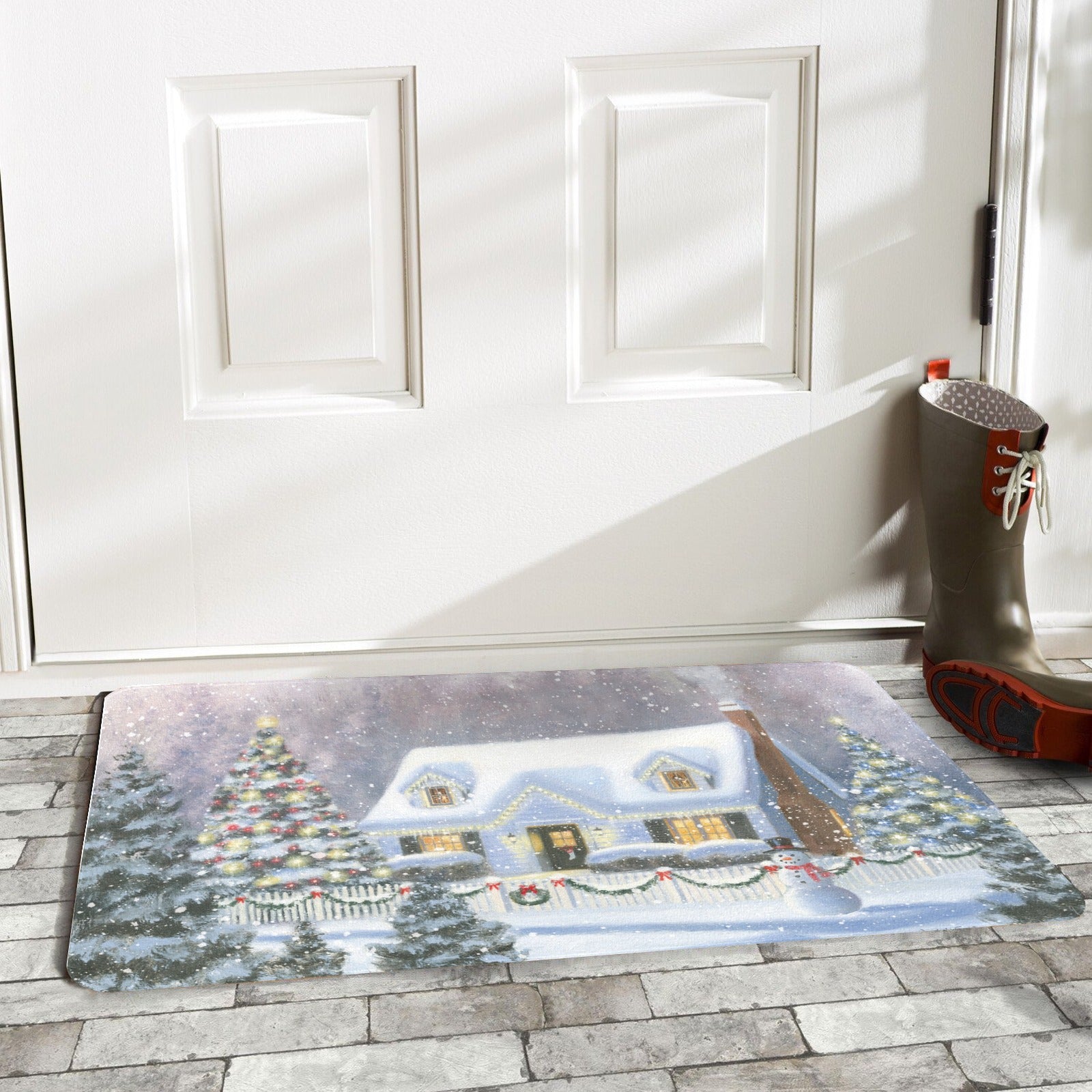 Christmas door mat with winter house and tree. For indoor/outdoor use, featuring a snowy scene.