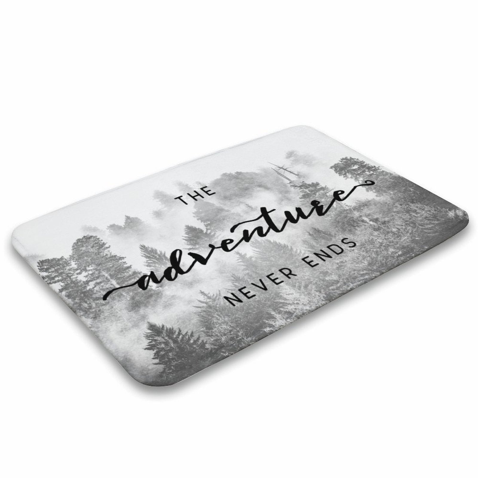 Coral velvet bath rug with "The adventure never ends" text and forest scene.