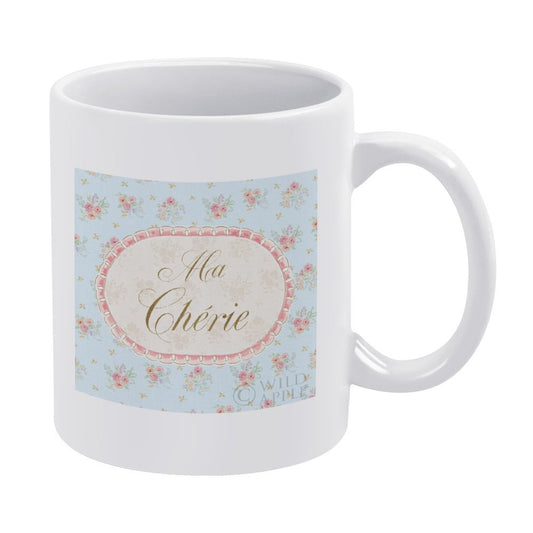 Personalized white ceramic coffee mug with floral design and "Ma Chérie" text, a customized gift.