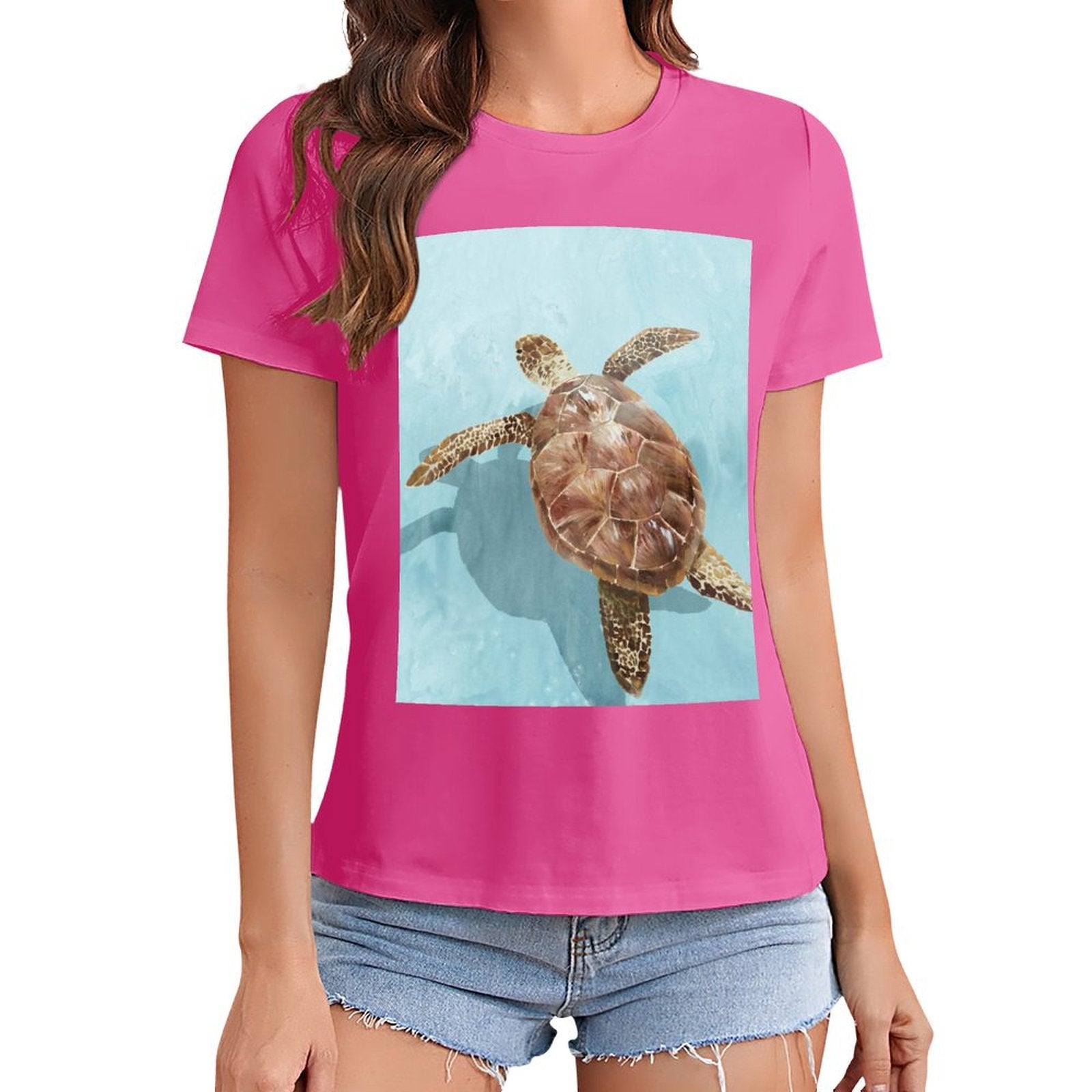 Women's pink crewneck t-shirt with sea turtle graphic, casual wear for summer