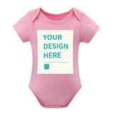Customizable pink baby bodysuit with 'YOUR DESIGN HERE' design, cotton material, perfect baby gift.