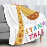 Kids' giraffe throw blanket with 'STAND TALL' text. Super soft flannel blanket.