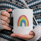 Personalized white ceramic mug with rainbow Pride design and black handle from MyArtsyGift