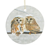 Personalized round ceramic Christmas ornament featuring two owls in winter, perfect Christmas gift.