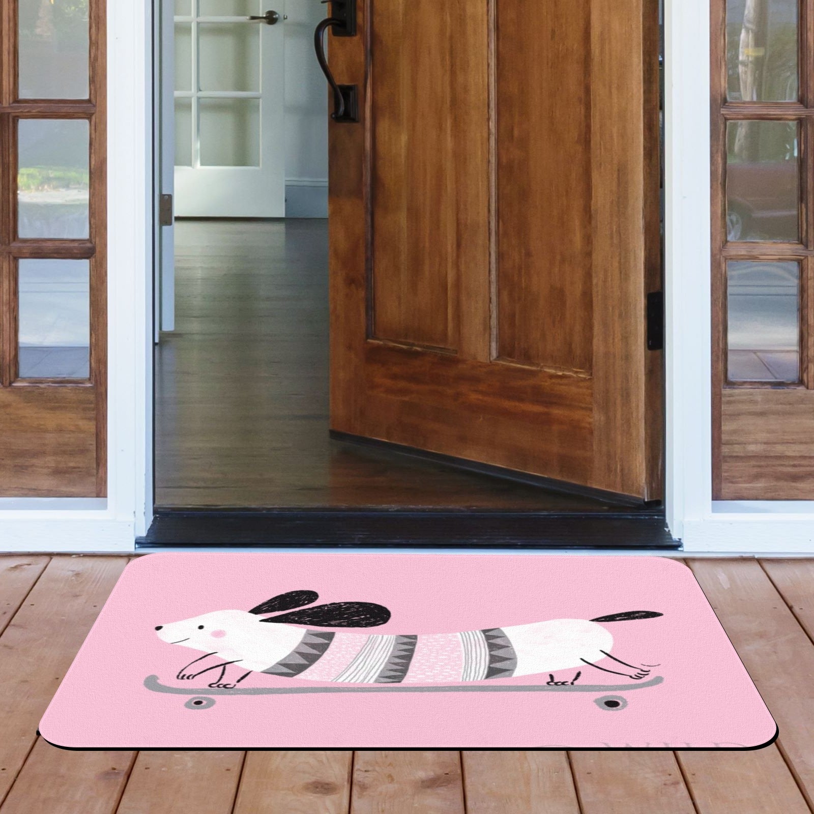 Pink dachshund doormat for indoor/outdoor use. Durable rubber floor mat with a skateboard dog design.