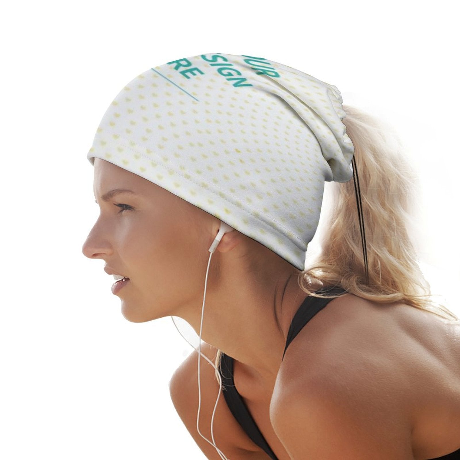 Custom design beanie for women with 'YOUR DESIGN HERE' print, worn by a woman with earphones