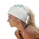 Custom design beanie for women with 'YOUR DESIGN HERE' print, worn by a woman with earphones