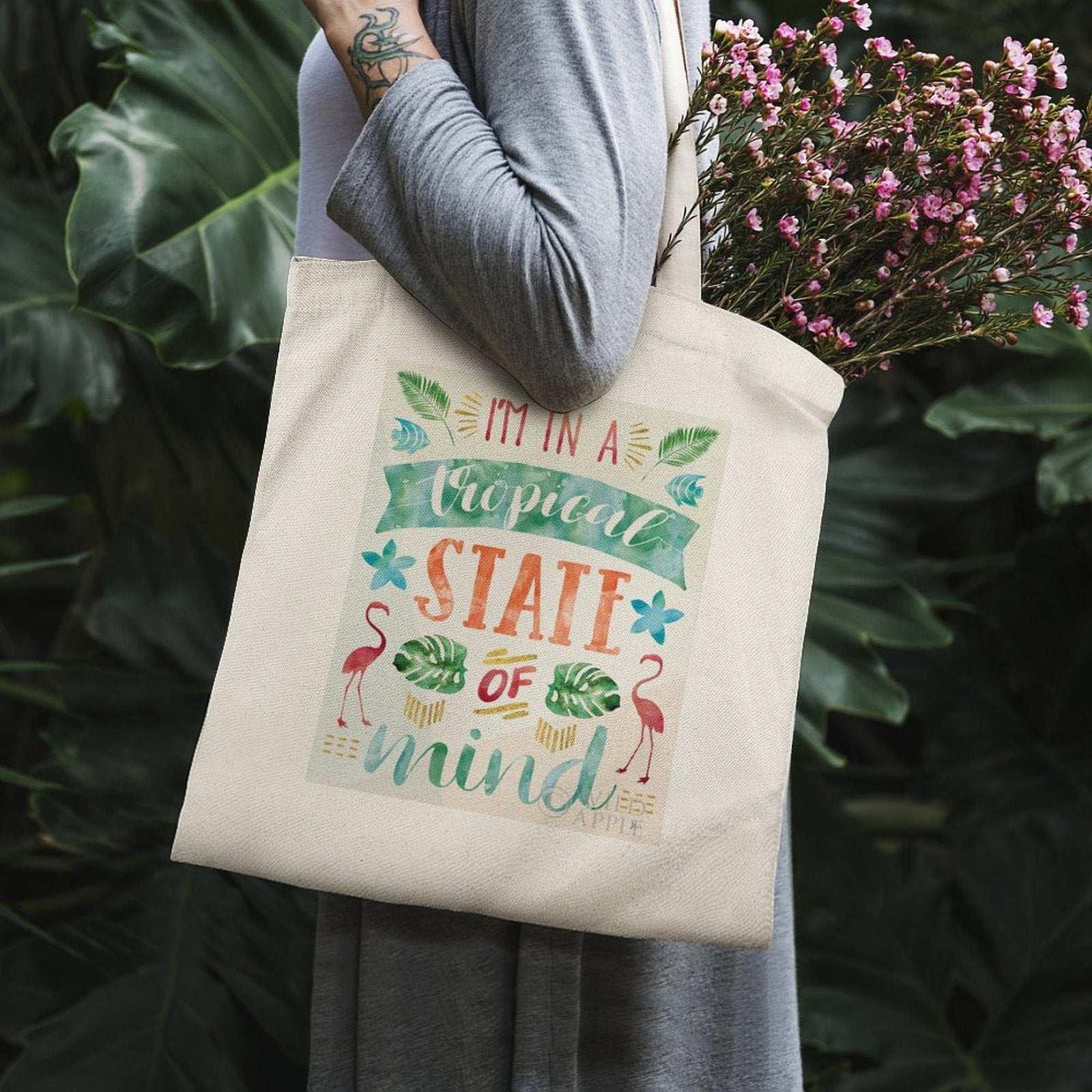 Canvas tote bag, "I'm in a Tropical State of Mind" design, perfect for shopping and travel.
