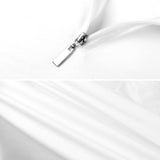 White Lycra long sleeve yoga shirt, half-zip detail with fabric texture, suitable for yoga and workout activities.