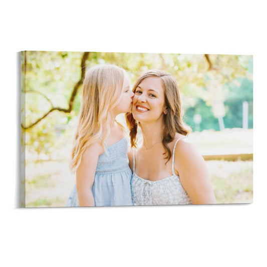 Mother and daughter sharing tender moment captured on stretched canvas, preserving family memories as wall art.