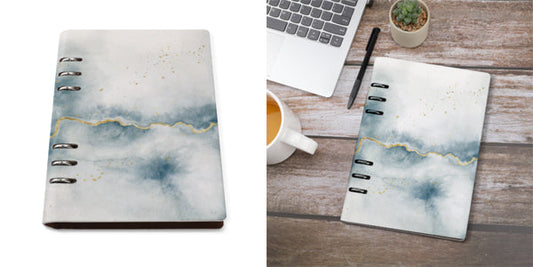 Custom loose-leaf spiral notebook featuring soft blue watercolor abstract art cover.