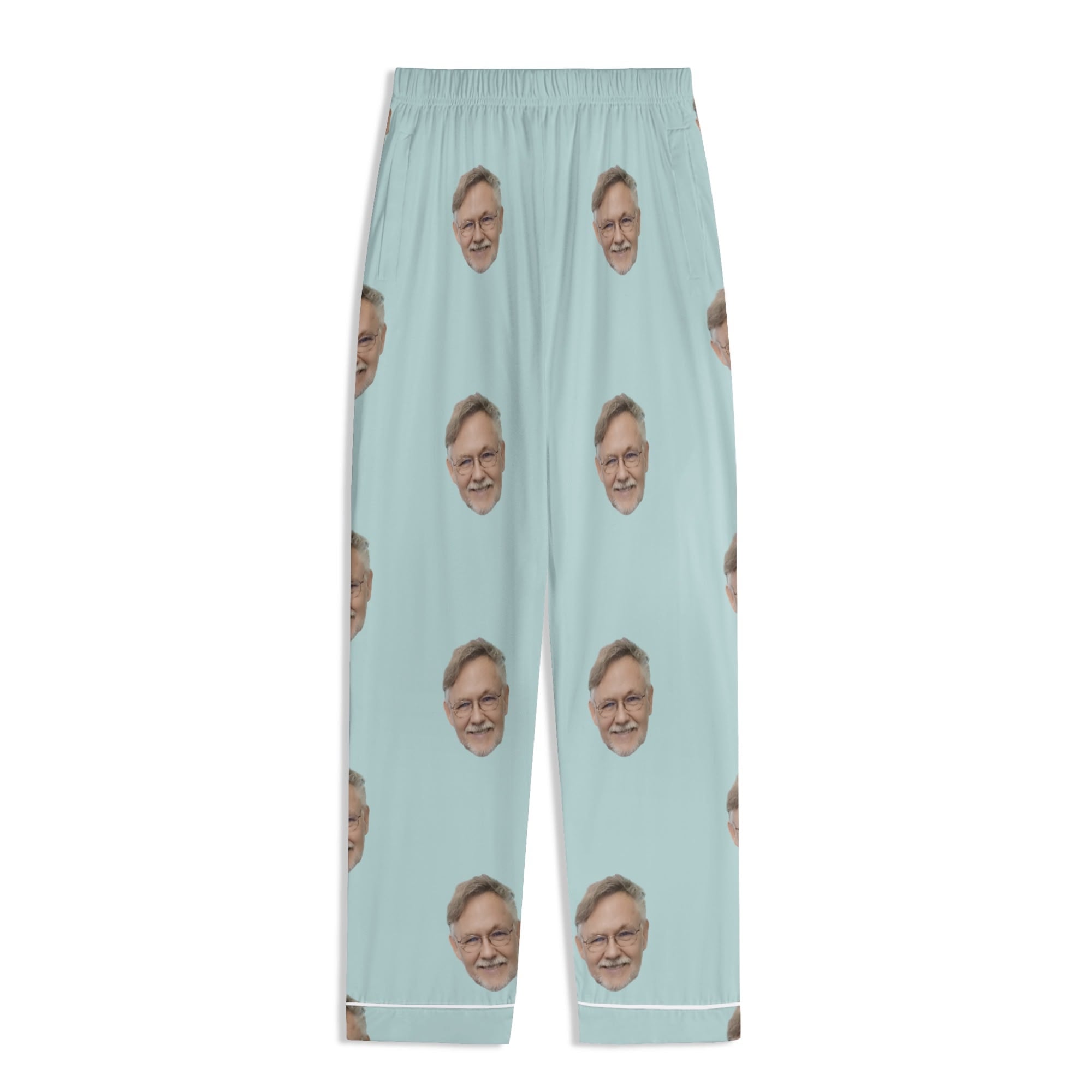 Custom personalized pajama pants with a repeating face pattern in light blue. Soft and breathable sleepwear.