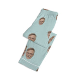 Custom light blue pajama pants featuring repeating face pattern; personalized sleepwear gift idea