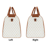 Foldable travel duffel bag with heart pattern, brown handles and edges, ideal gift for women and men.