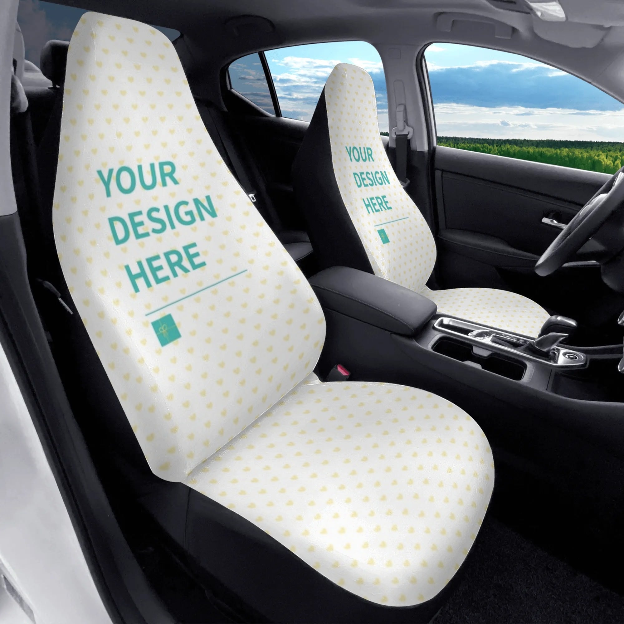 Personalized car seat covers. White fabric with yellow hearts, 'YOUR DESIGN HERE' text, car interior decor.