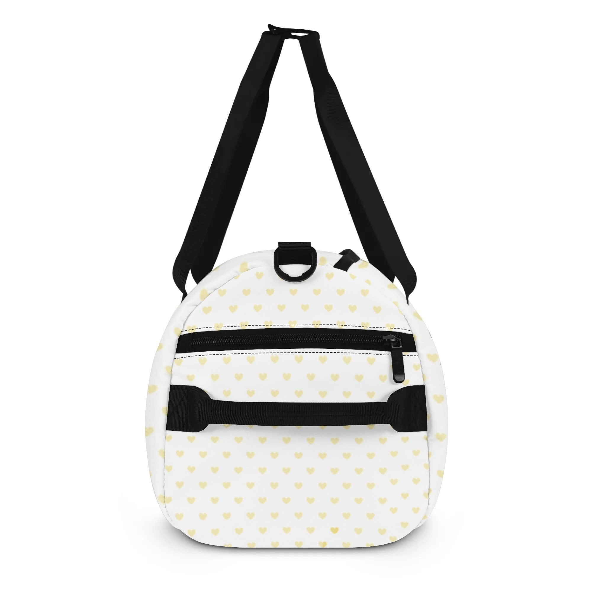 White gym bag with yellow heart pattern and black straps, personalized duffle bag.