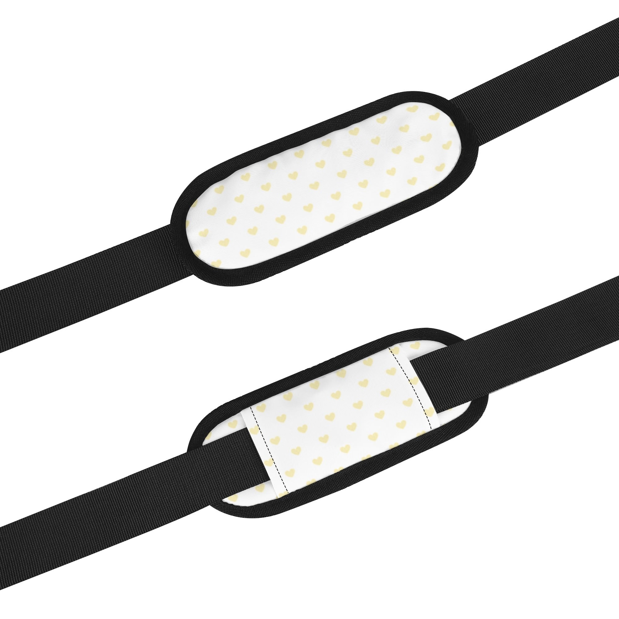 Personalized gym bag shoulder strap detail with yellow heart pattern, black strap, and shoulder strap.