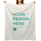 Custom fleece blanket with heart pattern and 'YOUR DESIGN HERE' text. Cozy, warm blanket for personalized gifts.