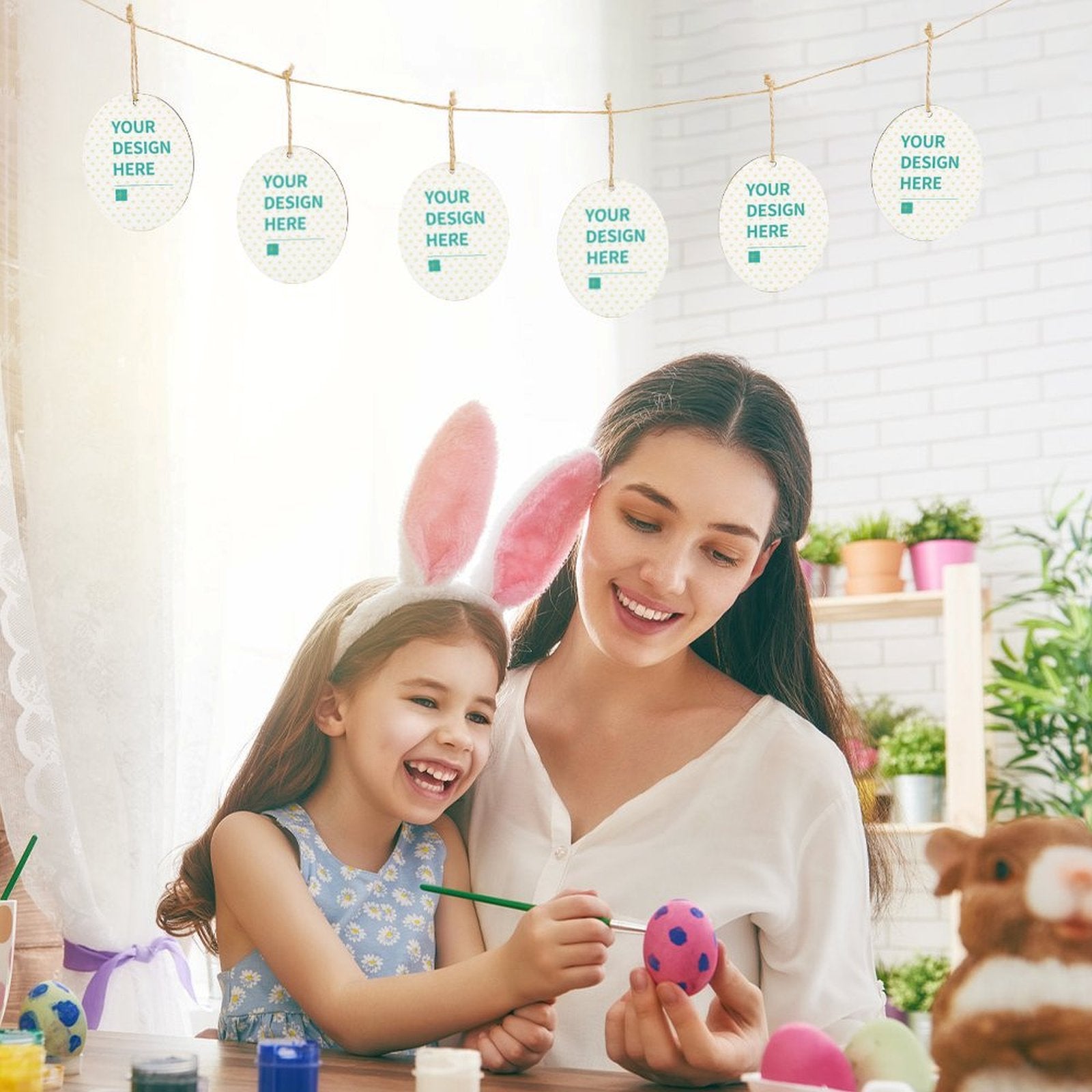 Customizable wooden egg hanging tags with rope, perfect for Easter home decor, featuring mother and daughter crafting eggs. 