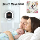 Square wall clock with floral design and 'stay beautiful' text, perfect for home decor and a peaceful environment.